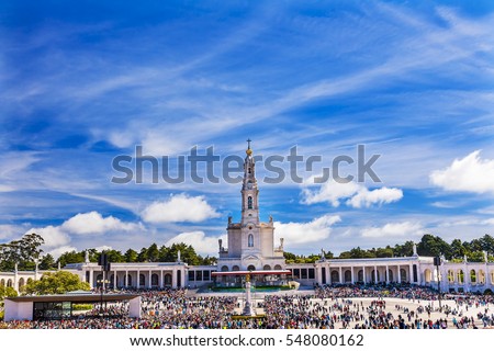 May 13th Celebration of Mary's Appearance Basilica of Lady of Rosary Bell Tower Fatima Portugal. Site where three Portuguese Shepherd children saw Virgin Mary of the Rosary.  Basilica created in 1953.