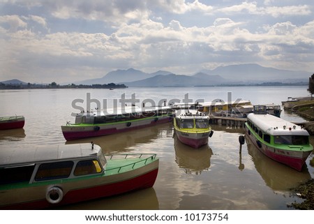 Taxi boats Janitizo Island Patzcuaro Lake Mexico.  Boats take residents and tourists to shore.