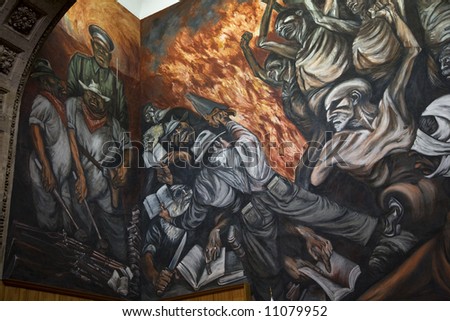 Mural by Jose Clemente Orozco in the University of Guadalajara, Mexico.  Orozco died in 1939. Workers and Peasants attacking corrupt military leaders and their police