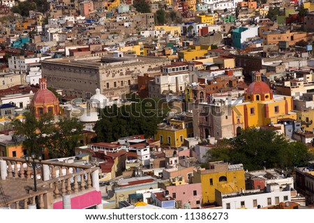 Colored Houses, Churches and Granary, Aihondiga de Granaditas, Guanajuato, Mexico.  The Granary was the site of the one of the major battles in the Mexican War of Independence.  No Trademarks