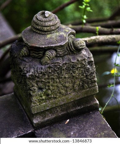 Old Stone Turtle Statue, Wuhou Memorial, Three Kingdoms Temple, Chengdu, Sichuan, China.  This temple was built in the 1700s.  Turtles are symbols of old age.