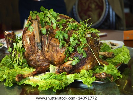 Roasted Whole Lamb with herbs and knife, Lanzhou, Gansu Province, China Uighur Muslem Area
