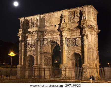 Constantine Arch at Night with Moon Rome Italy Stone arch built year 315 to celebrate Constantine\'s victory in 312