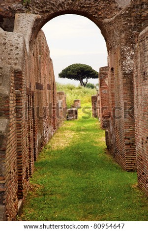 Ancient Roman Arch Walls Street Ostia Antica Ruins Rome Italy Excavation of Ostia, ancient Roman port, next to airport.  Was port for Rome until 5th Century AD.
