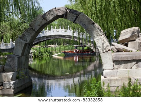 Canqiao Ruined Bridge Yuanming Yuan Old Summer Palace Willows Beijing China  Last existing bridge in the Old Summer Palace, which was destroyed in 1860 Second Opium War