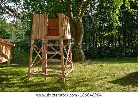 Hunter\'s box shooting stand in the forest - hunting image