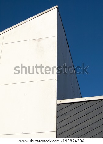 abstract architecture in clear straight lines blue sky background
