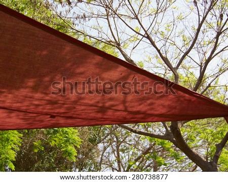 Colorful shade net shaped like a triangle in a park