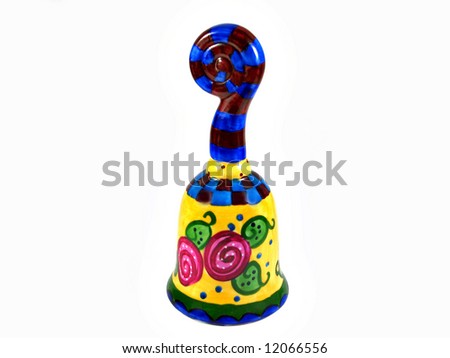 Primitive art hand painted bell isolated on white