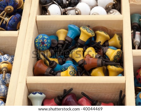 Colorful selection of DIY cabinets parts knobs for sale on display