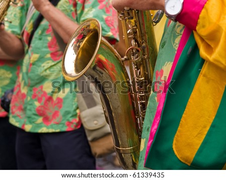 Caribbean Latin Samba style saxophone player musician in a concert