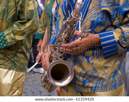 Brazil Rio Samba Carnival style saxophone player musician in a street concert