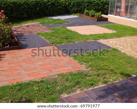 Display of different design garden stone floor tiles for outdoors