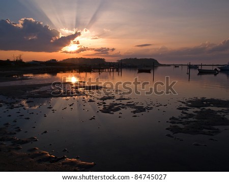 Boats in an amazing seascape of magical sunset - perfect nature boating background