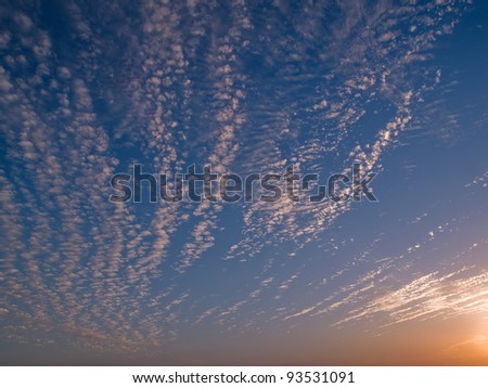 Perfect soft Cumulus clouds formation in sunset nature background
