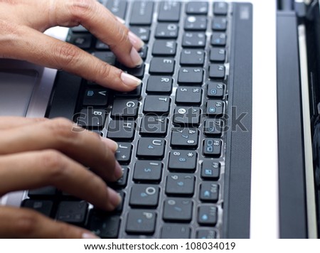 woman hand type with keyboard laptop