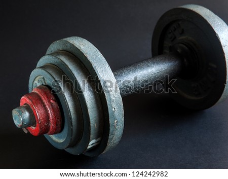 old dumbbell weight close up