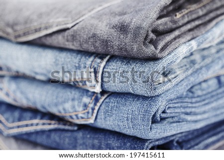 folded jean stack close up