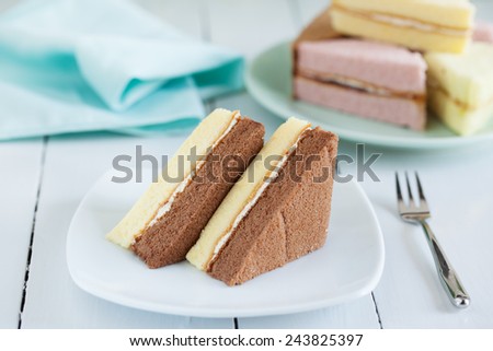 pieces of chocolate and butter chiffon cake on plate