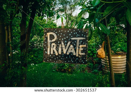 Private garden - Homemade private sign at the entrance of a vegetable garden.
