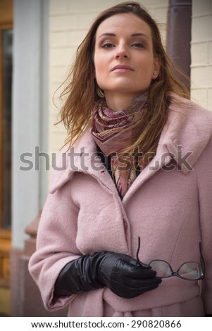 girl in a pink coat portrait in Kiev