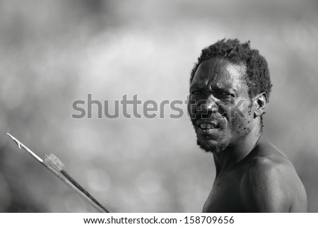 LAKE EYASI,ARUSHA/TANZANIA-CIRCA FEBRUARY 2012: unidentified male member of the Hadza tribe circa Feb 2012 in Lake Eyasi. The Hadza or Hadzabe are the last hunter-gatherers, clic-speakers of Tanzania.