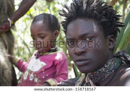 LAKE EYASI, ARUSHA/TANZANIA-CIRCA FEBRUARY 2013: portrait of unidentified member of the Hadza tribe circa Feb 2013 in Lake Eyasi. Hadza is the last tribe of hunter-gatherer, clic-speakers of Tanzania.