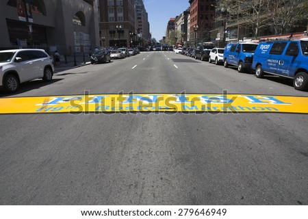 BOSTON,MASSACHUSETTS/USA-MAY 6: End line of Boston Marathon painted in street as on may 6 2015 in Boston, Massachusetts