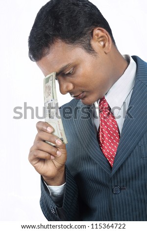 indian business man with indian money
