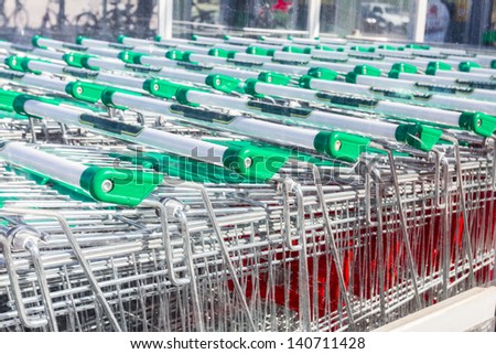 Close up, shopping carts outside of supermarket in rows./shopping carts/shopping