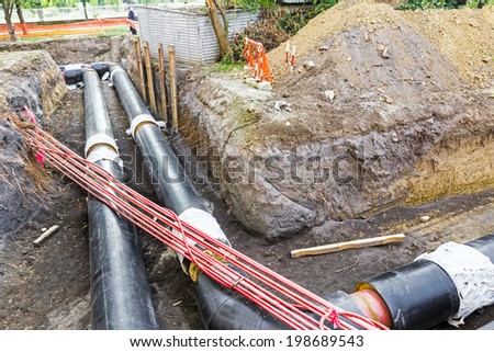 Work in progress, burying pipeline in a urban area.
