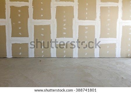 Front view of gypsum wall with joints at building site