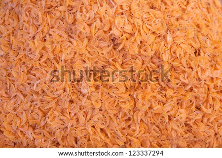 orange small shrimps background in market