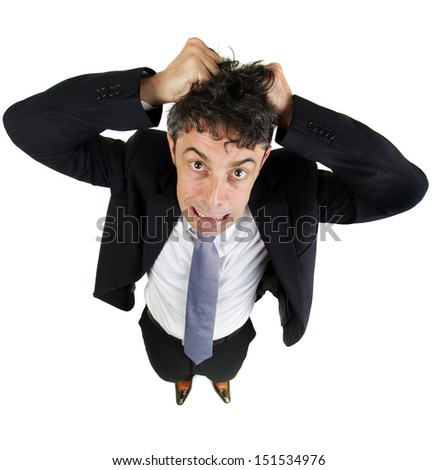 High angle fun portrait of a mature business man tearing out his hair in desperation and frustration isolated on white
