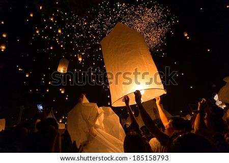 CHIANGMAI THAILAND NOVEMBER 16  : thai people launching sky lantern for Yi Peng buddhist Festival on november 16, 2013 Chiangmai, Thailand