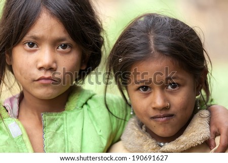 MUKTINAH, NEPAL, NOVEMBER 13 : two little Nepalese girls posing in the  Muktinah village, Annapurna , Nepal on 13 November 2010
