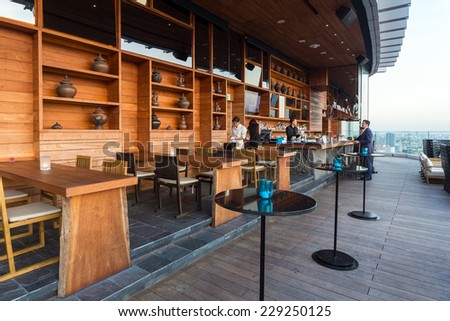 BANGKOK, THAILAND - NOV 29, 2013: The terrace of Octave rooftop Bar in Bangkok, Thailand. The Octave bar is located in the Thong Lor district near Sukhumvit road.