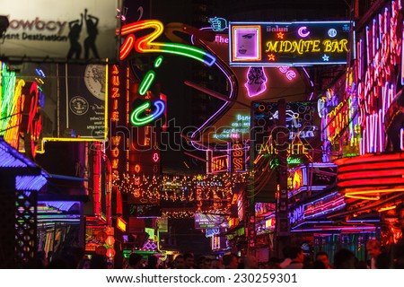 BANGKOK, THAILAND, JANUARY 31, 2012: View on the colorful neon lightings filling the Soi Cowboy street in the red entertainment district of Nana in Bangkok, Thailand
