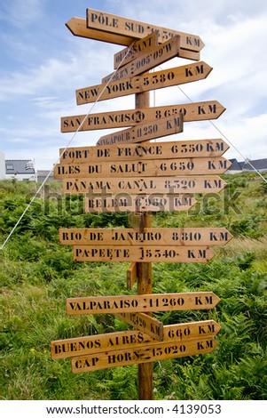 sign post with many world directions, ouessant island,france brittany