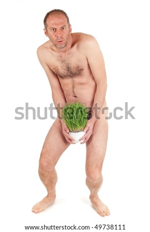 stock photo nude man hiding penis with grass flowerpot isolated on white