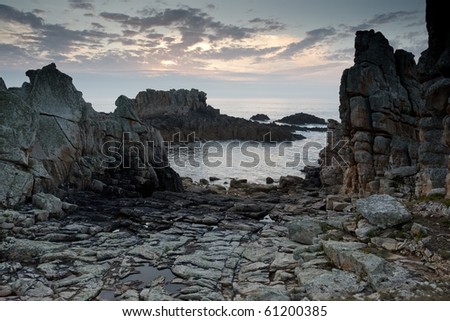 dramatic rocky coastline at dusk, ouessant island, brittany, france