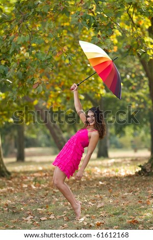 stock photo barefoot girl standing on tiptoe wearing pink dress with 