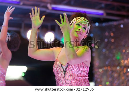 transgender thai singing on stage during night show, pattaya, thailand