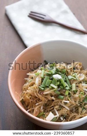 Vermicelli rice noodles fried with green onions, Asian cuisine food