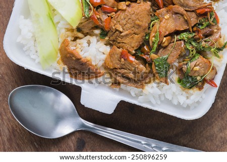 Thai fried pork basil sauce eating with rice.
