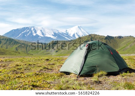 volcano landscape with tent on Kamchatka