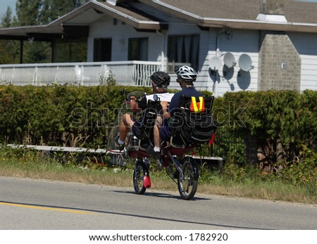 seniors riding tandem bike