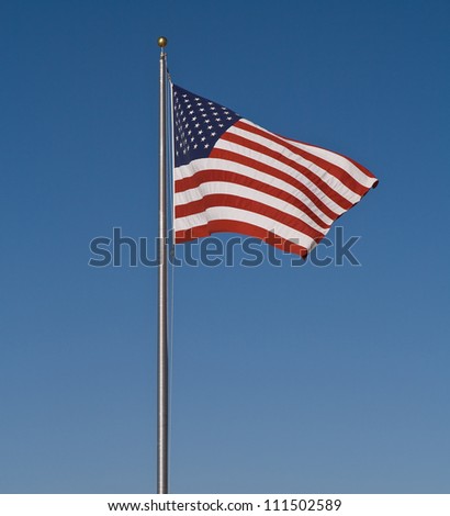 The Stars and Stripes set against a blue sky