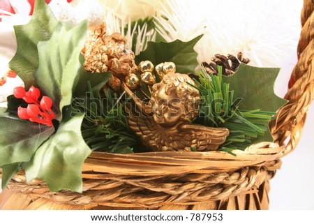 Cherub in a Christmas basket