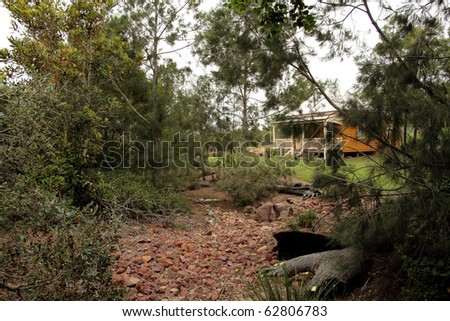 Country cottage hidden in the woods at tourist spot, Queensland, Australia.